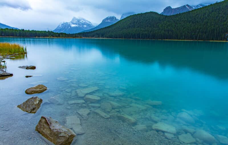 Reflection of the mountains off Waterfowl Lakes in Banff National Park Canada