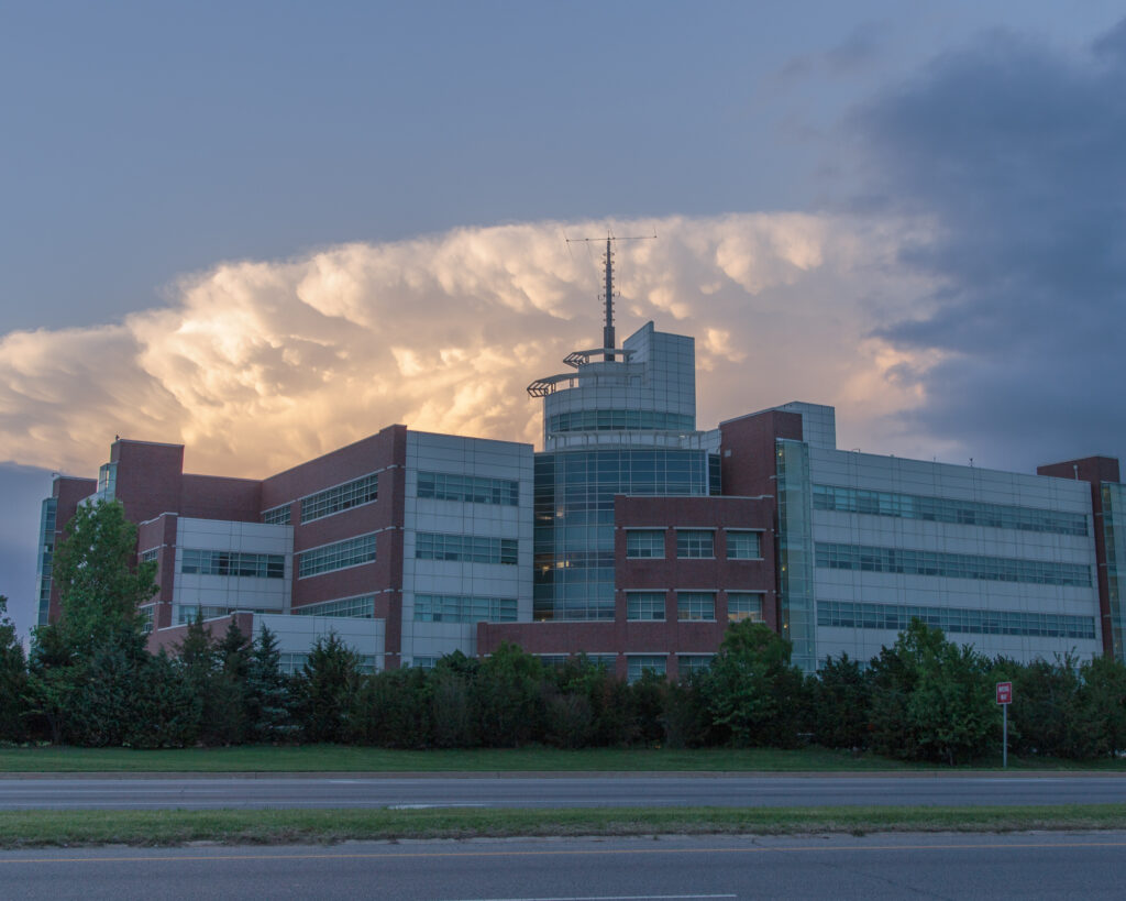 A storm looms over the National Weather Center, April 25, 2017