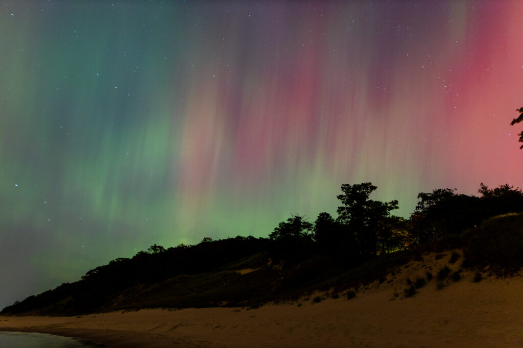 Auroras over sand dunes in Muskegon Michigan